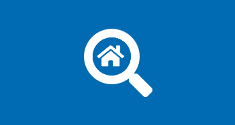 Magnifying glass icon with house