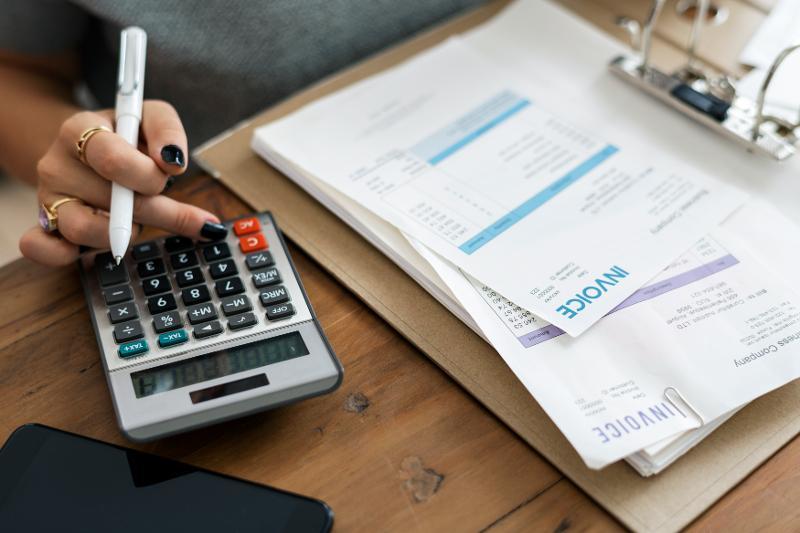 Household bills with calculator
