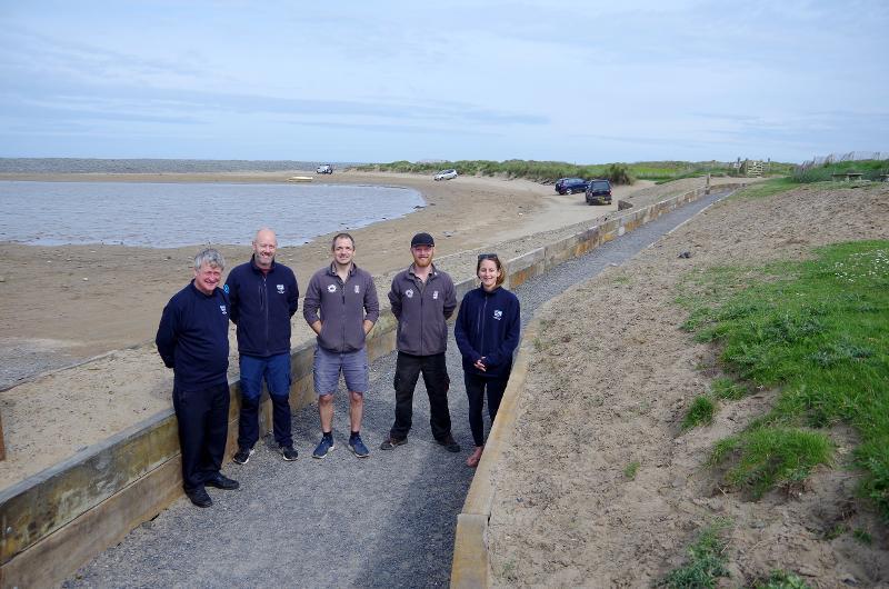 Picture L-R AONB officers Dave Edgcombe, Joe Newberry, TDC Rangers Mike Day, Adam Andrews and AONB officer Laura Carolan