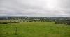 DCA 36: Popular viewpoint at Hatherleigh Moor looking southwards across pasture fields enclosed by hedges with trees towards Dartmoor.