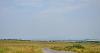 DCA 66: View west from Bursdon Moor towards the coast with Hartland Point radar dome and the shadow-like profile of Lundy on the horizon.