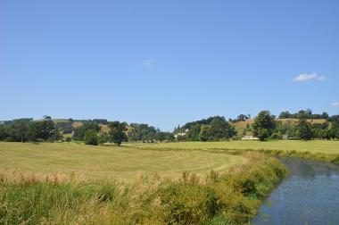 LCT 3C View north towards Castle Hill estate and mansion house, with parkland trees and pastoral floodplain.