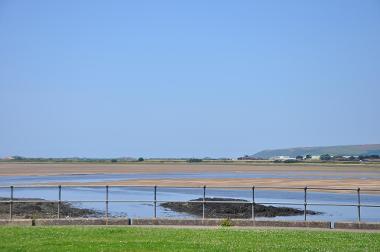 LCT 4A View north-west from the south banks of the River Taw towards Chivenor Royal Marine Barracks, with Braunton Down behind.