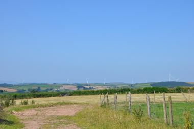 LCT 5C Elevated open farmland with views west towards Fullabrook Down wind farm and the coast beyond.