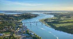 Drone shot Photo of Torridge Bridge over the river on a sunny day with blue sky. 