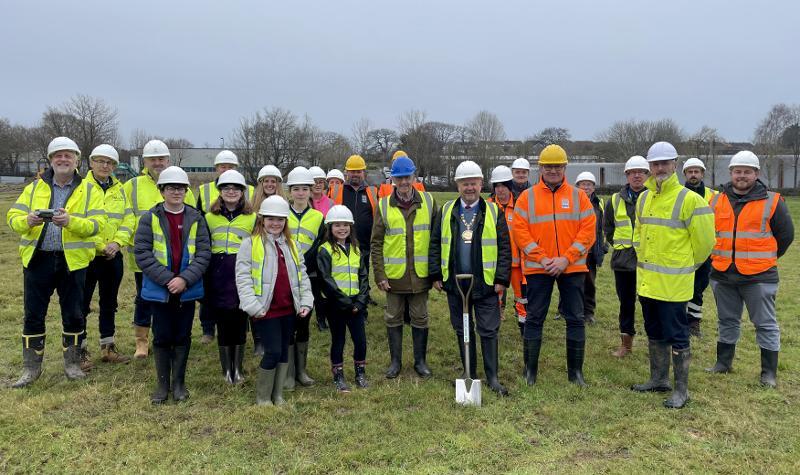 Councillors and officers along with children from East-the-Water Community Primary School turf cutting 