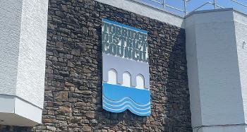 Picture of the Torridge Logo on the front of Riverbank House