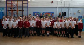 Pupils and Torridge Officers pose for a photo after the event