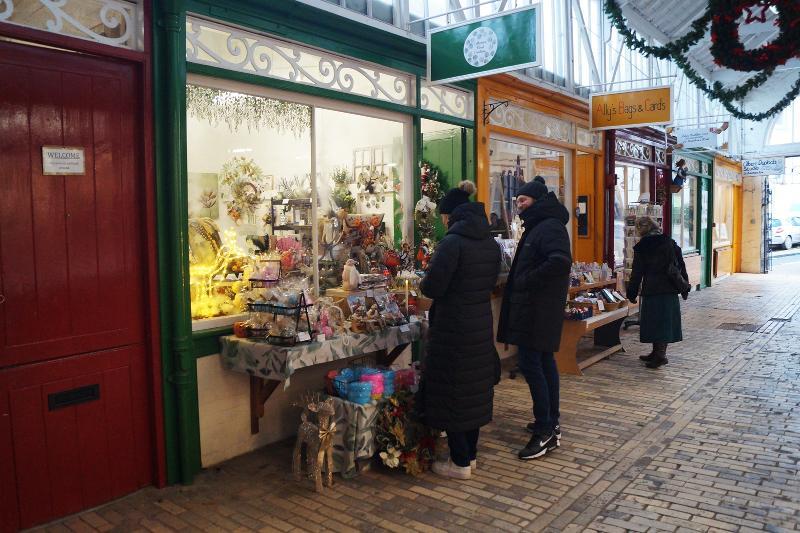 Image of people shopping in local shops at Bideford Pannier Market.