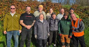 Group of people attending the volunteering event at Torrington Commons