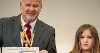 Councillor Bushby with the winner from West Croft School as she receives her prize. 