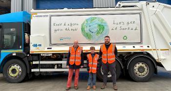 Cllr Leather, George and Joel Baker stood in front of the lorry with George's new design on the side. 